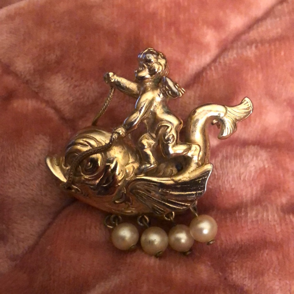 Gold colored fish and baby brooch